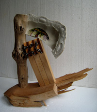 Under My Wing - 2010 - wood and metal - 510mm x 530mm x 180mm